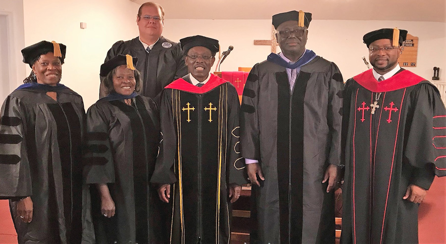Rev. Abraham Receives Honorary Doctoral Degree