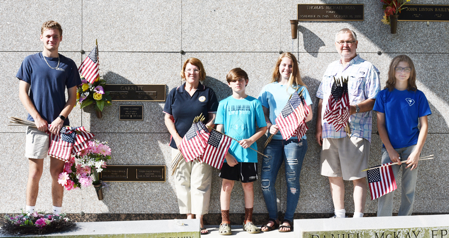 Group Places American Flags On Graves Of Veterans