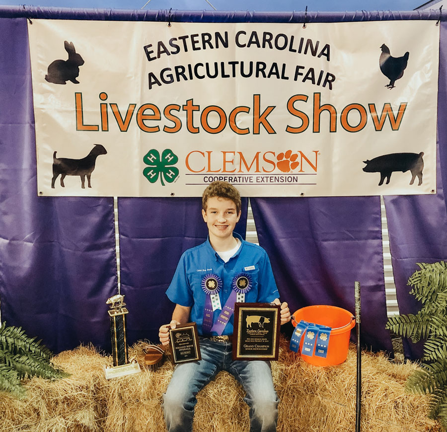 14-Year-Old Shows Grand Champion Pig