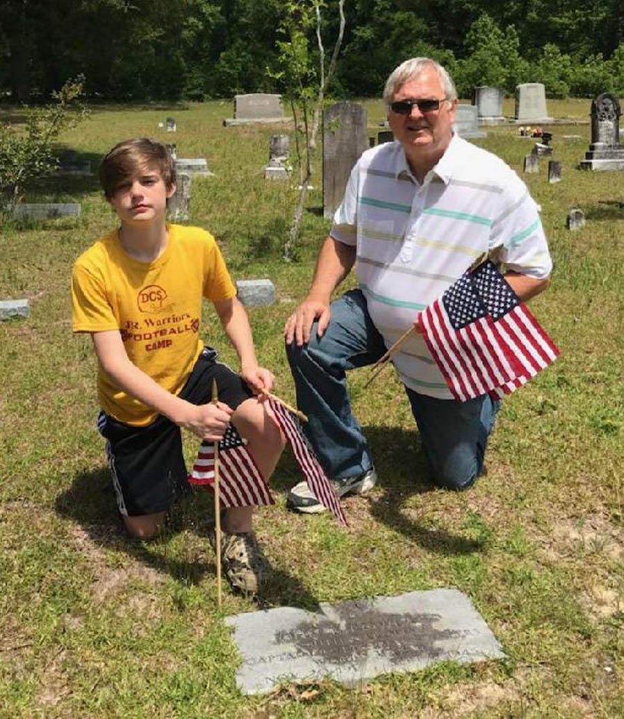 Group Places Flags In Cemeteries For Memorial Day
