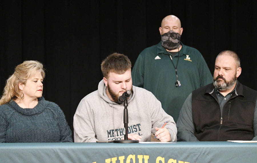 Two LHS Football Players Sign To Play At Next Level