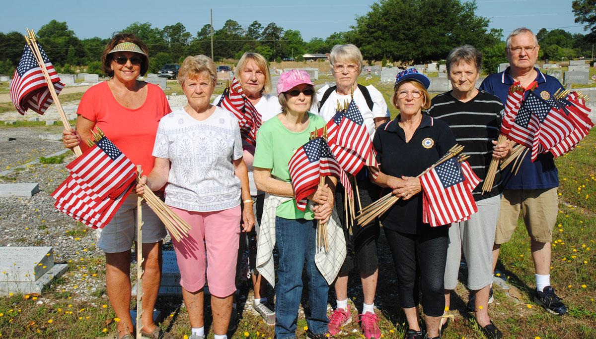 Local Group Places Flags In Cemeteries