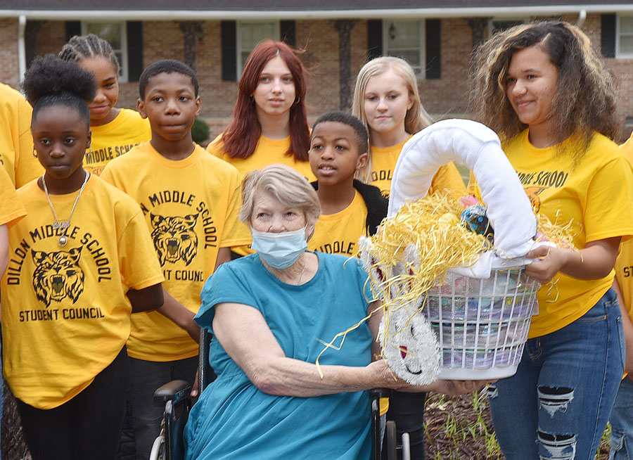 DMS Students Present Easter Gifts To Pruitt Health Residents