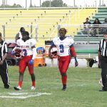 Mullins captains with officials