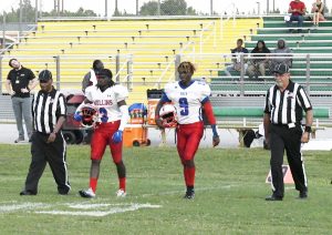 Mullins captains with officials