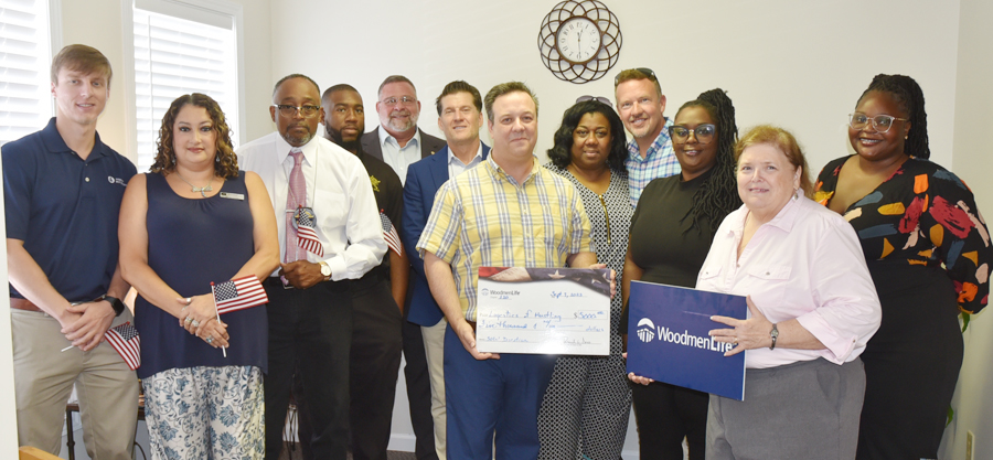 Woodmen Life Makes Donation To Logistics Of Hustling